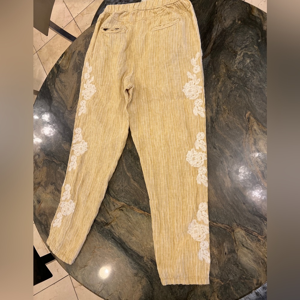 Anthropologie linen-blend pants with pockets.